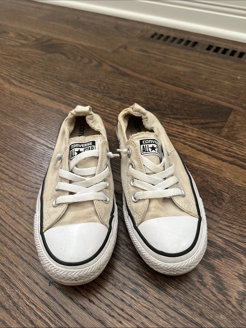 Converse women’s  Low Top Canvas Sneakers in Cream and White